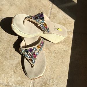 Volatile jeweled flip flops